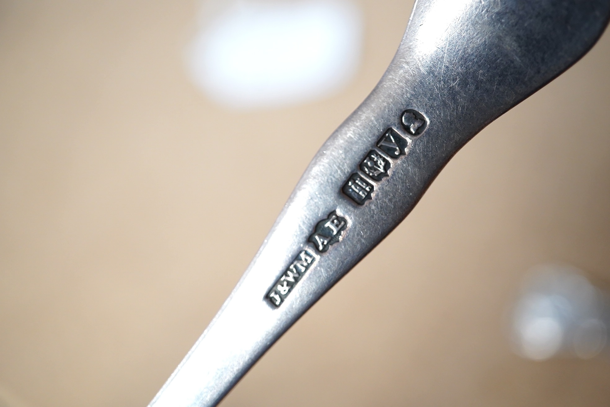 A pair of William IV Scottish silver King's pattern toddy ladles, James & William Marshall, Edinburgh, 1830, 14.2cm, 71 grams. Condition - poor to fair